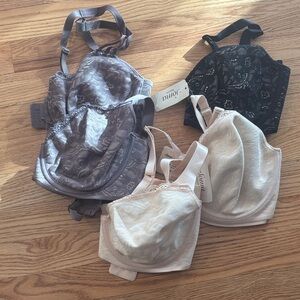 Soma Bras in Black, Beige and Cream.  Two of the five are brand new.